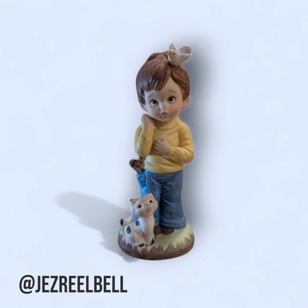 Charming Figurine with Cat